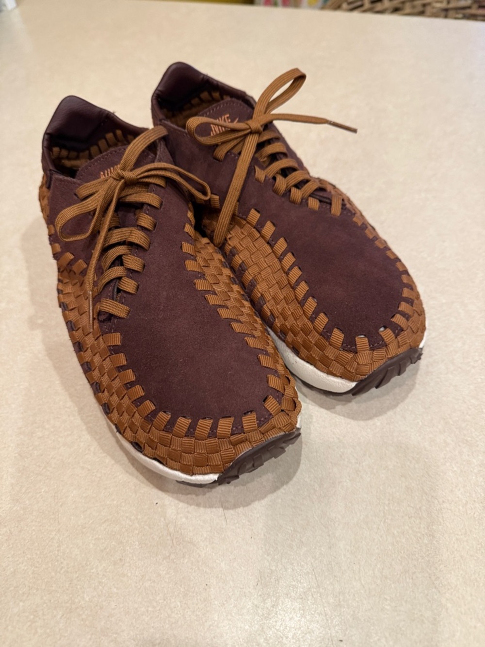 Nike Air Footscape Woven Women’s Athletic Shoes.